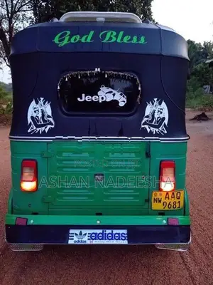 Bajaj RE 2014