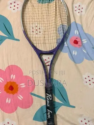 Pizza Inn Tennis Racket