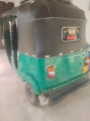 Bajaj RE 2011