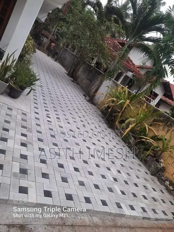 Interlock Bricks and Malaysian Grass Carpet