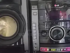 LG DM5540 Mini Hi-Fi System With Black Speakers