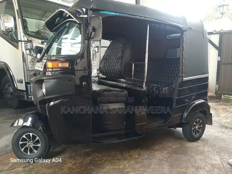 Bajaj RE 2013
