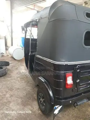 Bajaj RE 2013