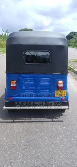 Bajaj RE 2011