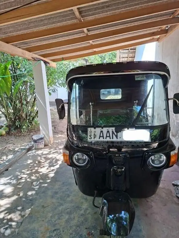 Bajaj RE 2014