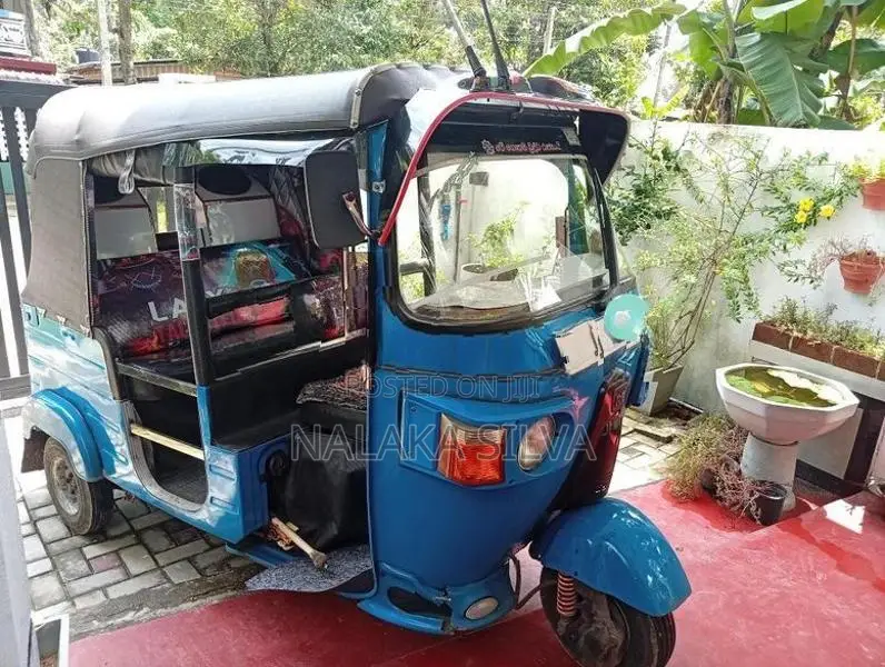 Bajaj RE 2011