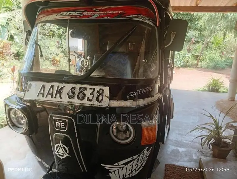 Bajaj RE 2014