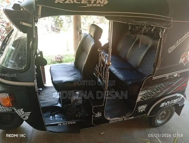 Bajaj RE 2014
