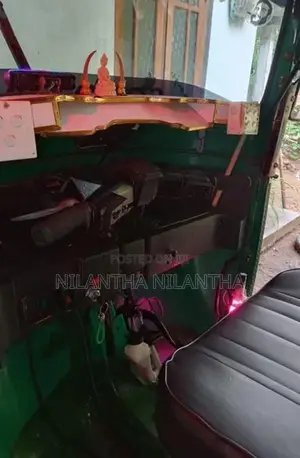 Bajaj RE 2013