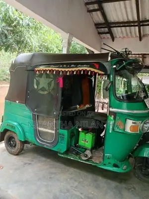 Bajaj RE 2013