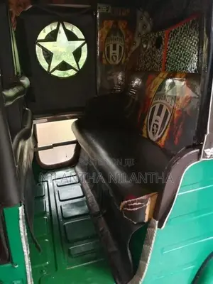 Bajaj RE 2013
