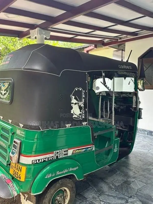 Bajaj RE 2013