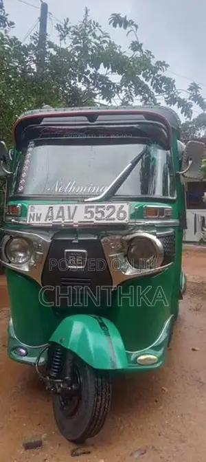 Bajaj RE 4 stroke 2014