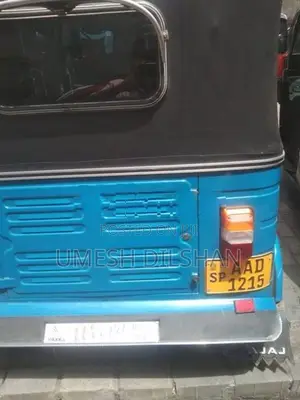 Bajaj RE 2014