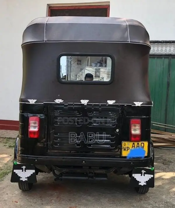 Bajaj RE 2014