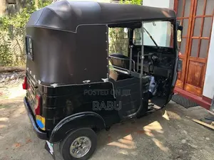 Bajaj RE 2014