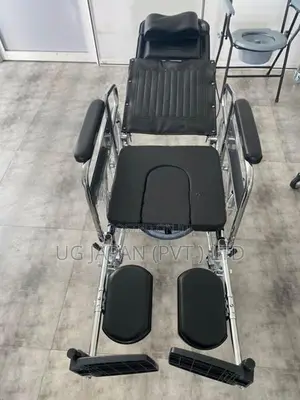 Full Option Wheelchair with Commode.
