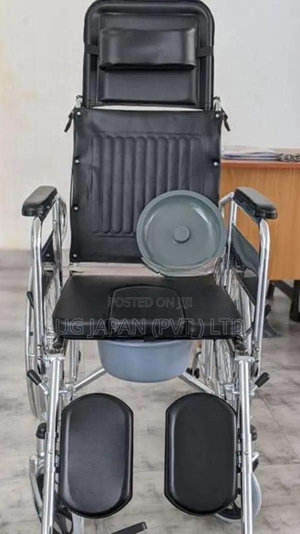 Full Option Wheelchair with Commode.