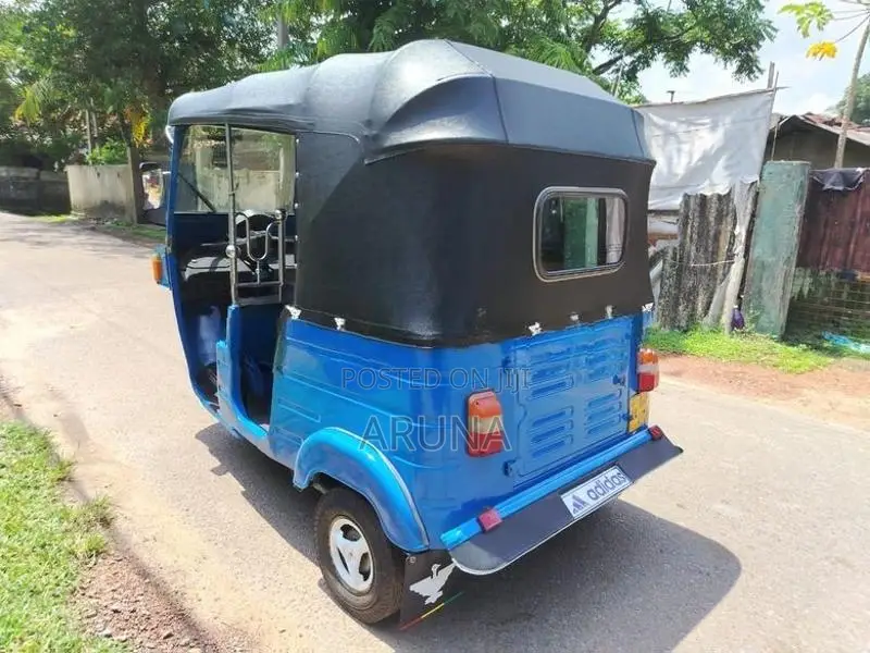 Bajaj RE 2013