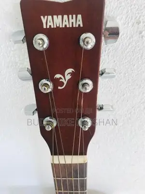 Yamaha F310 Guitar with Padded bag