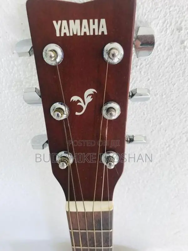 Yamaha F310 Guitar with Padded bag