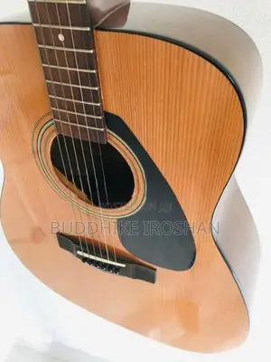 Yamaha F310 Guitar with Padded bag