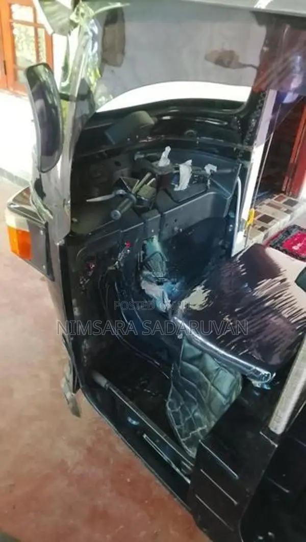Bajaj RE 2013