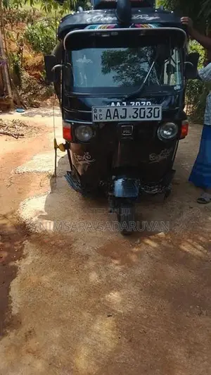 Bajaj RE 2013