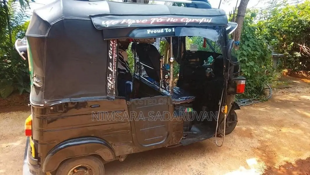Bajaj RE 2013