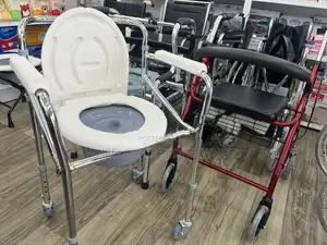 Commode chair with wheel