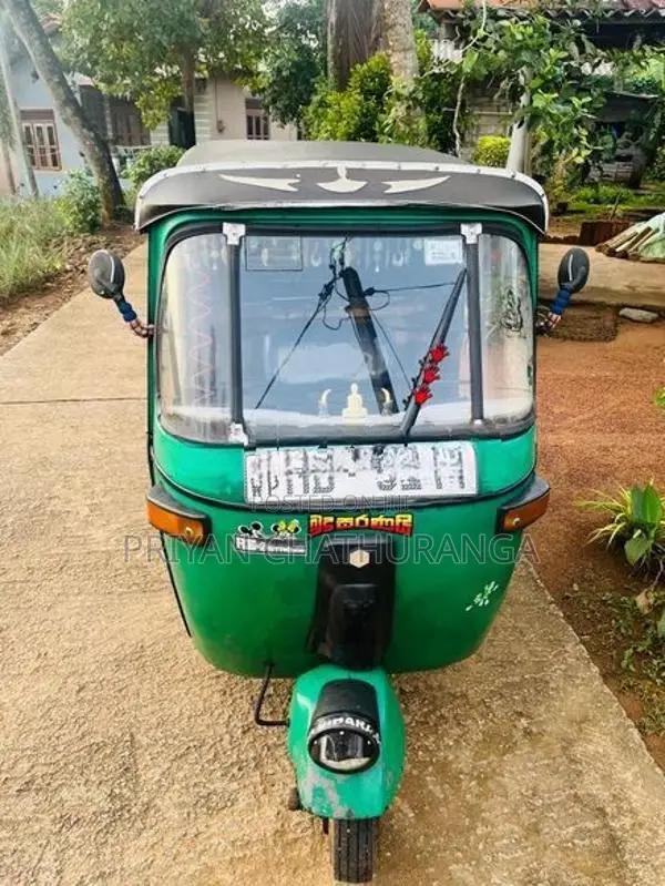 Bajaj RE 2 stock wheel 2003