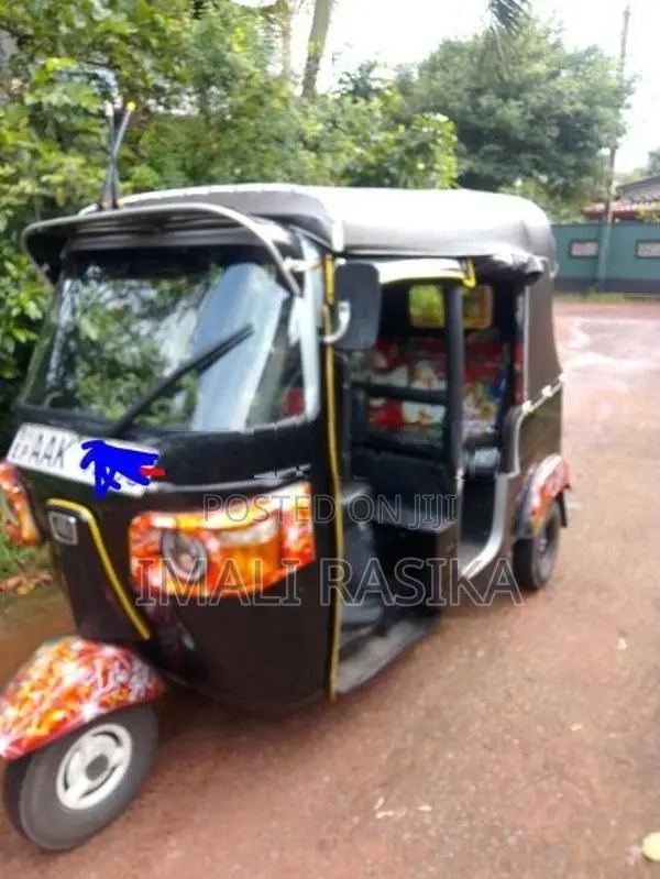 Bajaj RE 2013