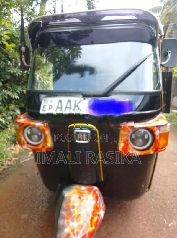 Bajaj RE 2013