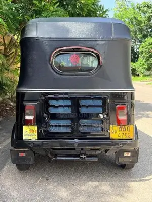 Bajaj RE 2014