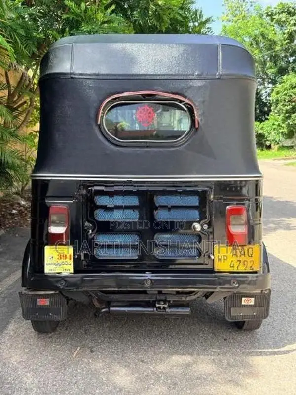 Bajaj RE 2014