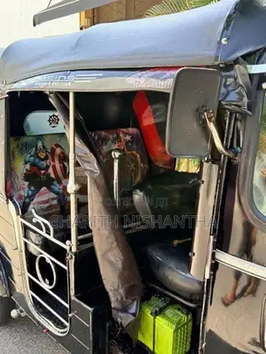 Bajaj RE 2014