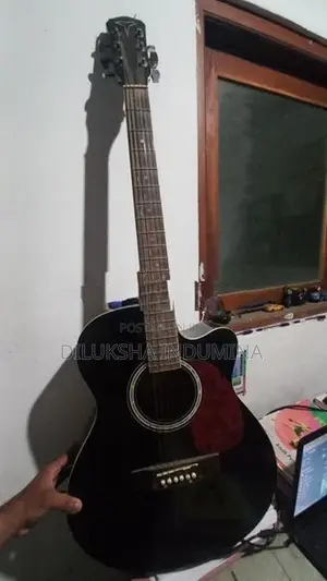 The Olive Tree Black Guitar