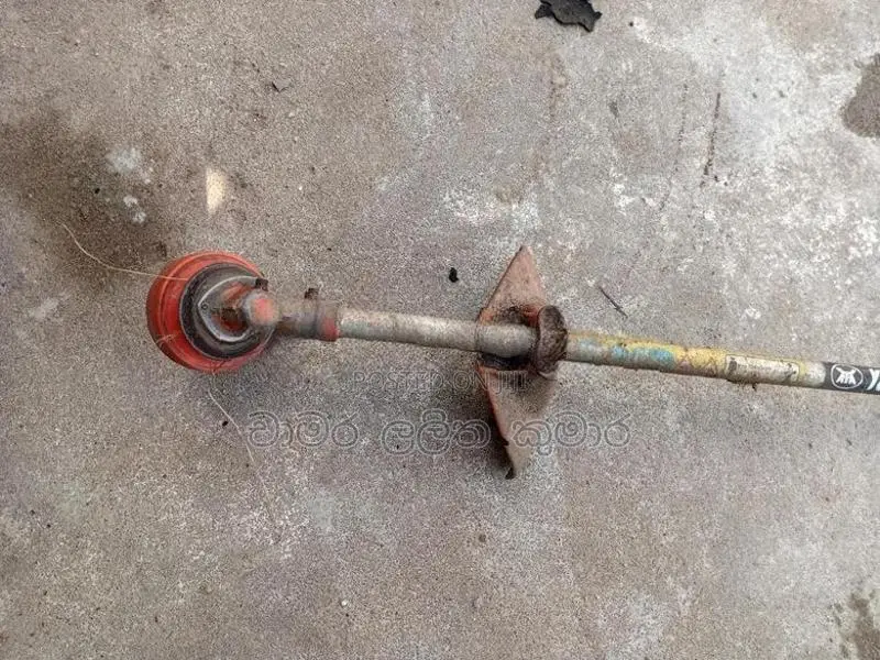 තණකොළ කපන මැසින්