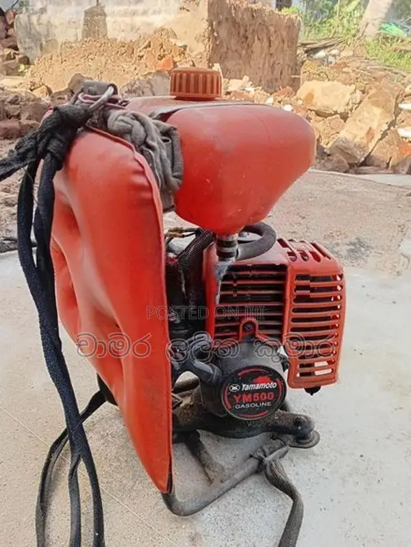 තණකොළ කපන මැසින්
