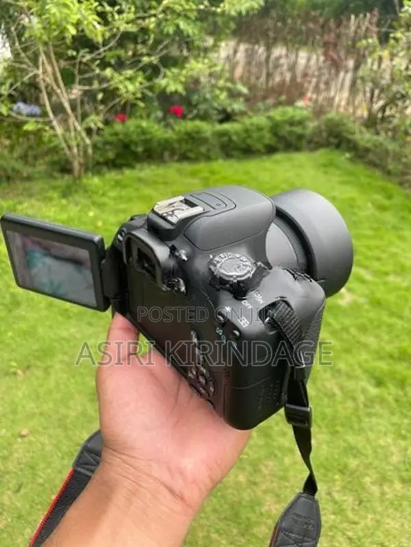 Canon EOS 700 D with 50mm F1.8 18-55mm Lens