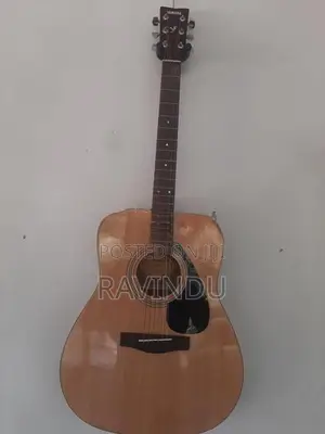 Yamaha F310 Guitar with Paded Bag