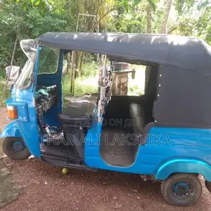 Bajaj RE 2011