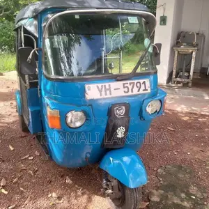 Bajaj RE 2011