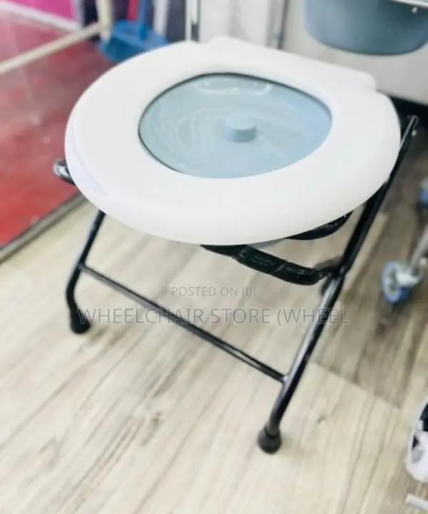 Commode stand with bucket