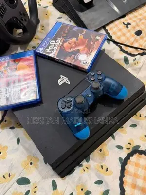 PS4 Pro 1TB + Racing Wheel with Consoles