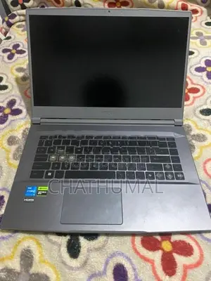MSI Thin 15 B13UCX Gaming Laptop