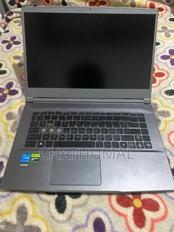 MSI Thin 15 B13UCX Gaming Laptop
