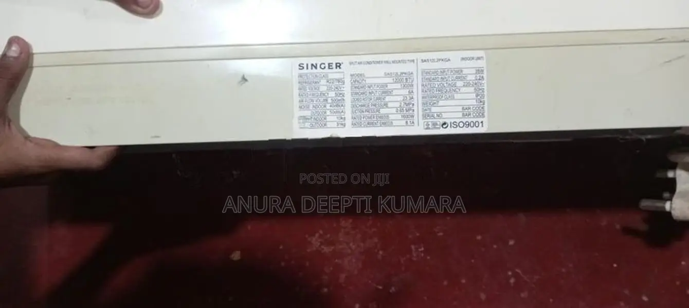 Singer Ac