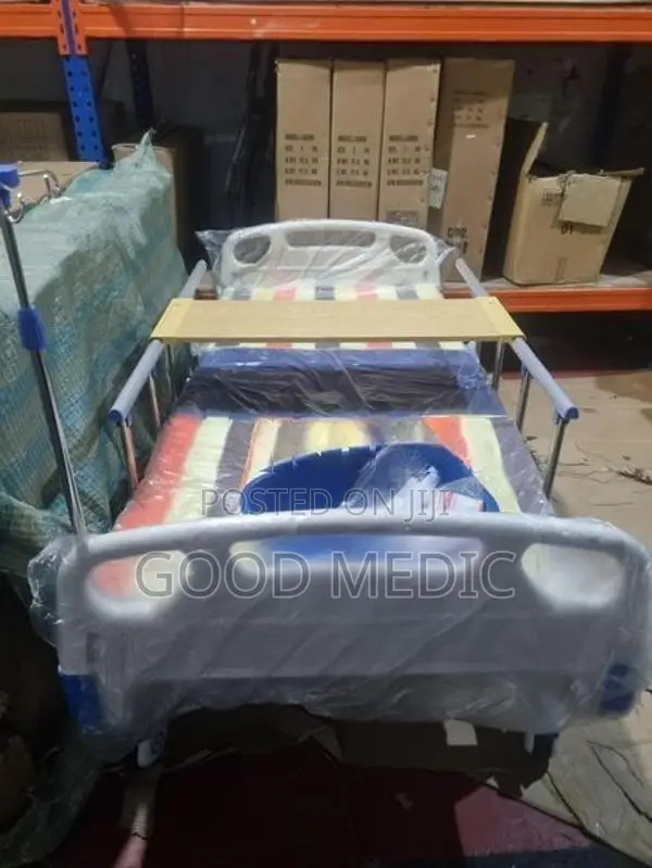 Four-Function Manual Bed with Lateral Tilt and Sanitary Functionality