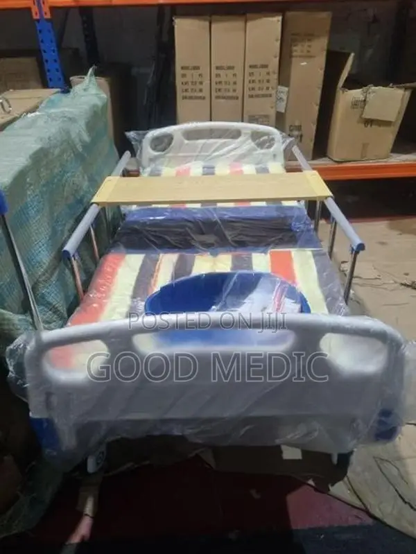 Four-Function Manual Bed with Lateral Tilt and Sanitary Functionality